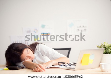 Beautiful young asian woman resting at office when finish work, woman working concept Royalty-Free Stock Photo #1038665962