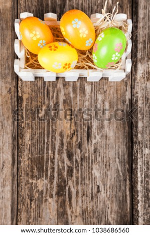 Easter still life with Easter eggs. Easter eggs in a white box, top view. . Easter greeting card.