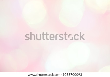 Amazing abstractions. Abstract background with bokeh effect. Blurred defocused lights Light gray background. Trendy Holographic foil
