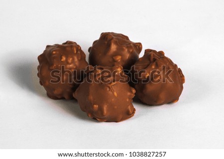 Chocolate truffles on white background