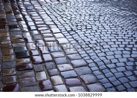 Street of granite stones in the old town - pavement
