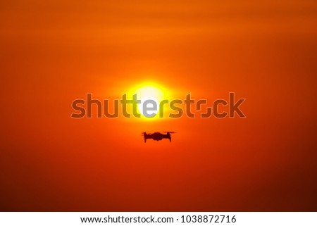 beautiful twilight landscape the sunrise background with small drone camera and videos silhouette future technology and is popular intrend today