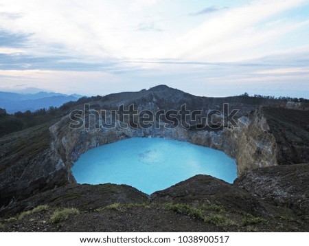 Amazing view of turquoise crater lake in Kelimutu National park, Indonesia.