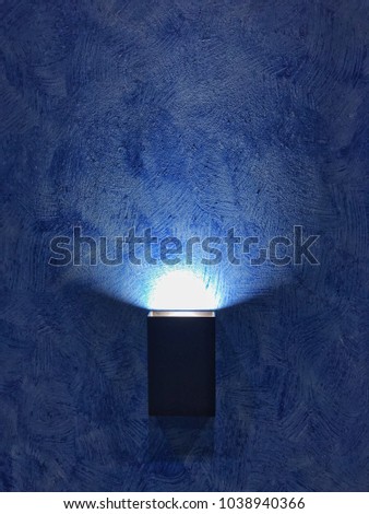 Wall light in blue color