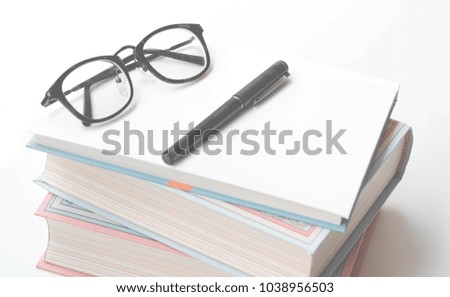 
Glasses and books,Selective focus