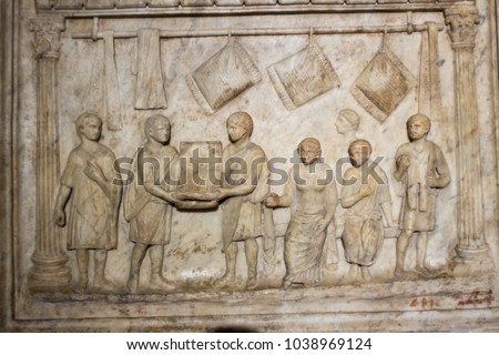 roman writing and bas-reliefs imperial era archeology italy