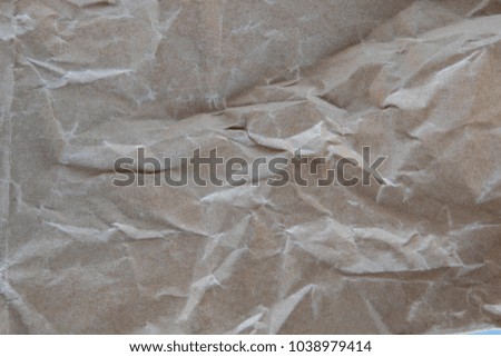 Brown crumpled paper texture.