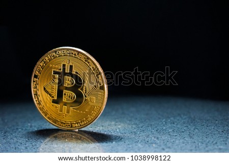 Golden Bitcoin On dark Background. Trading Concept Of Crypto Currency coin. Copy space