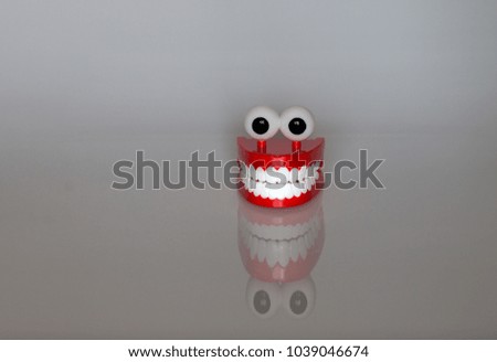 Teeth mock up on gray background and low light.