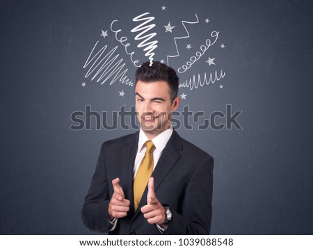 Young businessman with white scribbles around his head