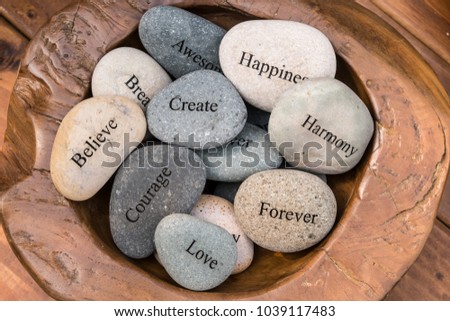 Garden Stones, Rocks with Motivational Words Inscribed on them, Love, Happiness, Believe, Harmony, Courage, Create.
