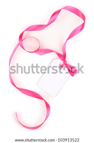 Blank gift tag with pink satin bow and ribbon isolated on white