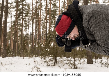 Photographer in the forest