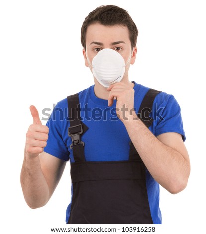 A worker with a mask and a thumbs up sign, isolated on white