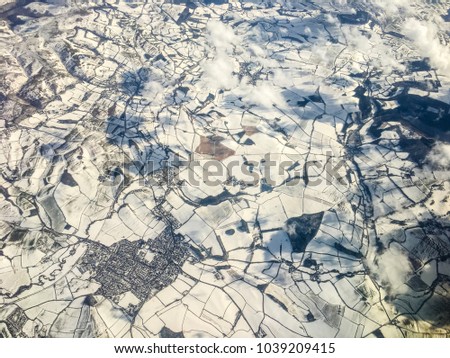Aerial photo of south west of UK covered in snow from storm Emma