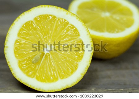 Fresh lemon cut in half. Citrus fruit
