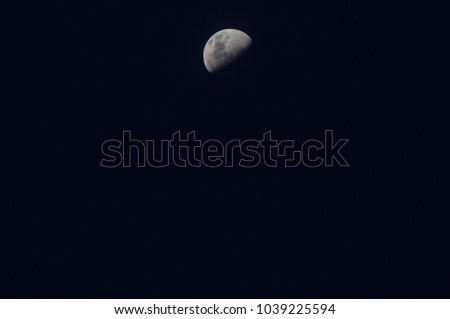 half moon in night sky