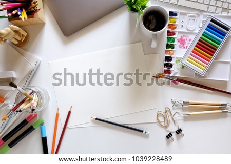 Conceptual image of Artist graphic designer workplace white table.