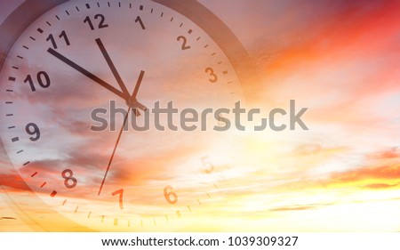 Clock face in bright sky. Time passing Royalty-Free Stock Photo #1039309327