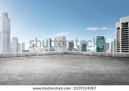 The roof of building with skyscrapers view on the city Royalty-Free Stock Photo #1039324087
