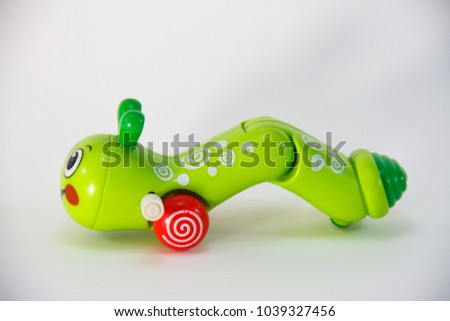 Worm, Plastic Toy Animal isolated on white background.