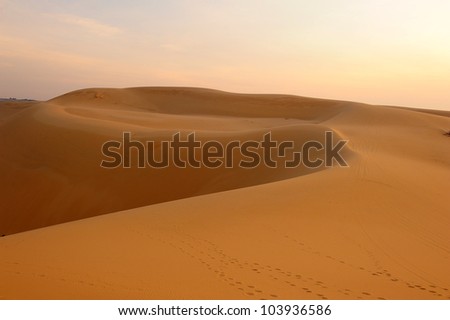 Deserts and Sand Dunes Landscape at Sunrise
