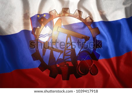Oil rig against the background of the flag of Slovenia. Mixed environment. The concept of oil production, minerals, development of new deposits, well.