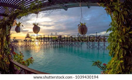 Mabul island sunset view from resort Royalty-Free Stock Photo #1039430194