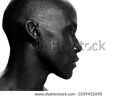 Close up side portrait of african american man staring Royalty-Free Stock Photo #1039432690