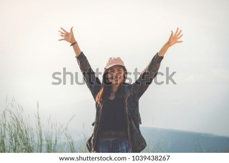Asian  young women people Hiking with friends backpacks walking together and looking map and taking photo camera by the road and looking happy ,Relax time on holiday concept travel