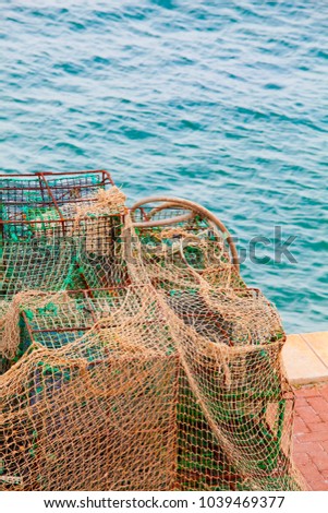 Lobster pots and crab pots drying in the sun on the pier