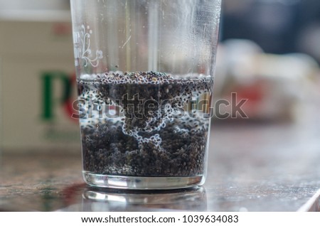 Photograph of a chia seeds in a glass with water