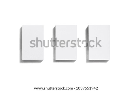 Photo of blank business cards stacks on white background. Isolated with clipping path. Flat lay.