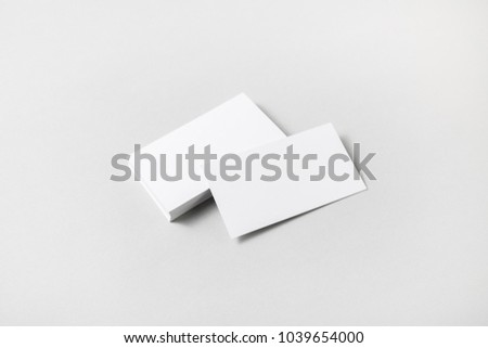 Blank white business cards on paper background. Mockup for ID. Template for graphic designers portfolios.