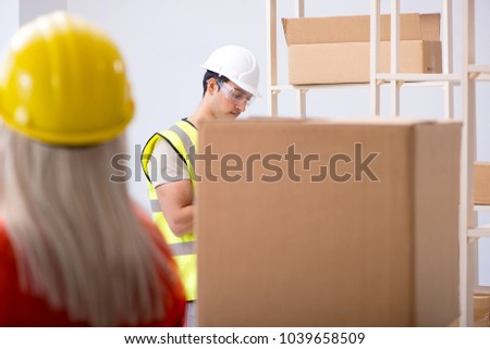 Delivery contractor delivering boxes to office