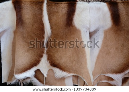 Market ornaments for sale deer pelts