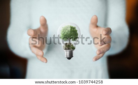 Tree in a lightbulb, concept of nature, environment