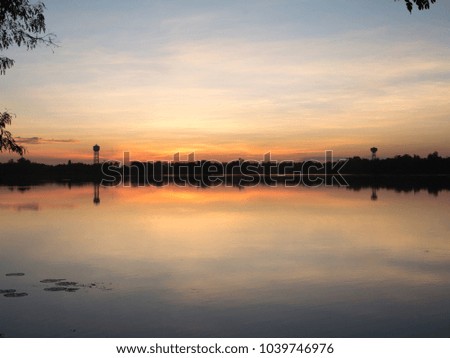 Golden sunrise behind the lake