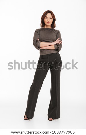 Photo of amazing woman isolated over white background looking camera.