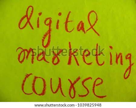 Text digital marketing course hand written by red oil pastel on yellow color paper