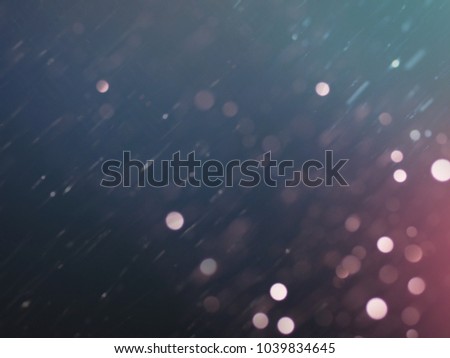 Light Bokeh White and Pink With Rain Rhythm Elements on Dark Blue and Red Background ,Free Copy Space.