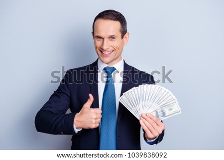 It's a trap! Close up portrait of cunning suspicious confident wealthy satisfied businessman wants you to be business partners investors, making finger up symbol isolated on gray background