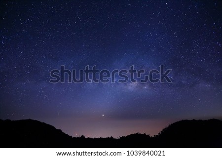 The Panorama Milky way galaxy with stars and space dust in the universe, Long exposure photograph, with grain.foreground summit tropical forest , thailand