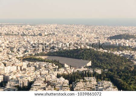 View of Athens from Lycabettus Hill with the Panathenaic Stadium in the center of the photo , Greece

