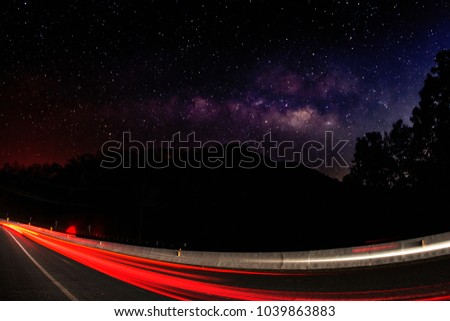 Milky way with car lights