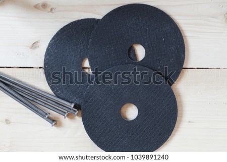 Cutting circles lie on wooden boards