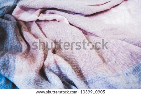 Colorful cloth placed on the white paper