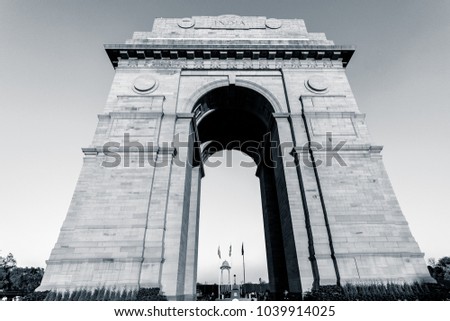 India Gate war memorial in black and white located in New Delhi in India. India Gate is the most famous tourist attraction to visit in New Delhi. Eastern Architecture of India Gate is marvellous.