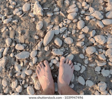 Foot on the stone