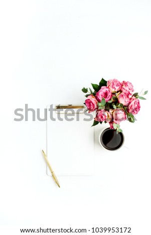 Clipboard, rose flowers bouquet, coffee and pen on white background. Flat lay, top view paper blank mockup.